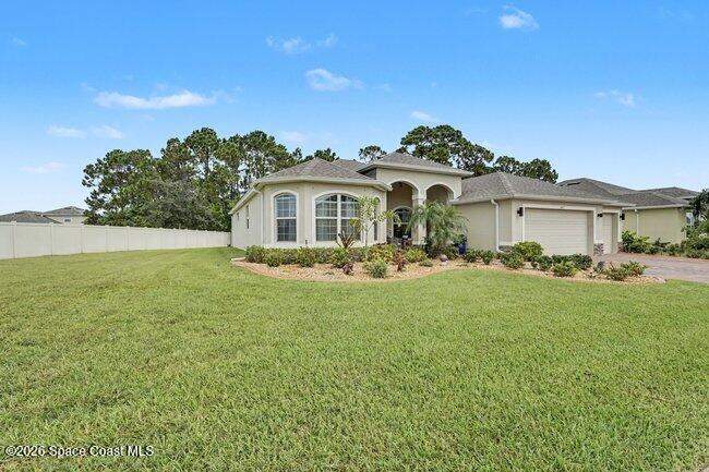 4 bedroom Single Family Residence at 607 SE Gleneagles Drive, Stonebriar at Bayside Lakes, Palm Bay — photo 2