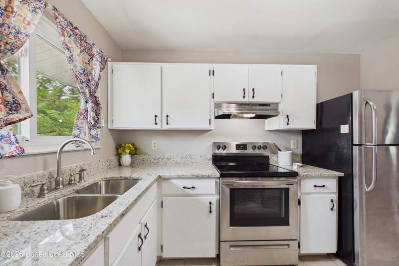 2 bedroom Single Family Residence at 467 Grenadier Avenue, Port Malabar Unit 14, Palm Bay — photo 2