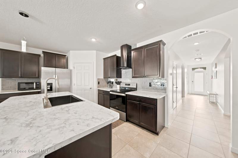4 bedroom Single Family Residence at 6024 Orsino Lane, Adamson Creek Phase 1-B, Cocoa — photo 4