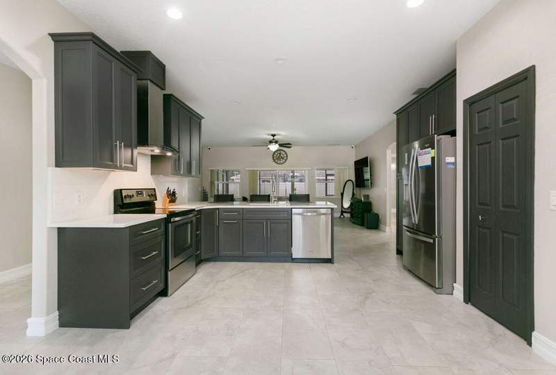 4 bedroom Single Family Residence at 426 Oakleaf Street, Port Malabar Unit 32, Palm Bay — photo 2