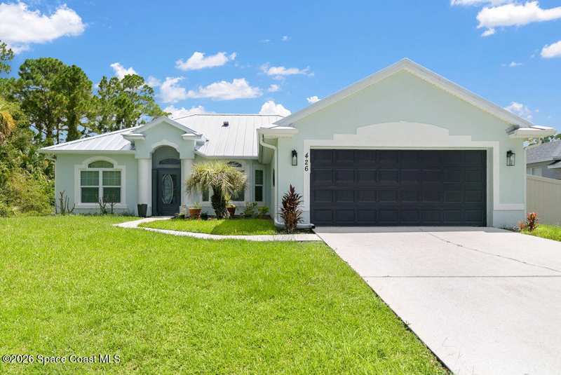 4 bedroom Single Family Residence at 426 Oakleaf Street, Port Malabar Unit 32, Palm Bay — photo 1
