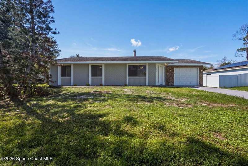 3 bedroom Single Family Residence at 428 Trumpet Street, Port Malabar Unit 19, Palm Bay — photo 1