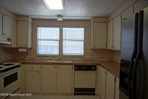 434 Royal Tern Drive, Barefoot Bay FL - photo 13 of 33