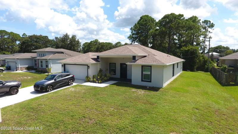 4 bedroom Single Family Residence at 1548 Rainsville Road, Port Malabar Unit 16, Palm Bay — photo 2
