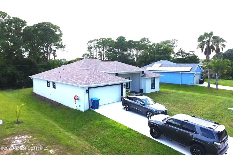 4 bedroom Single Family Residence at 1548 Rainsville Road, Port Malabar Unit 16, Palm Bay — photo 3