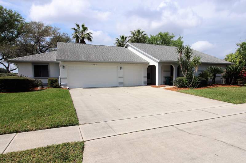 4 bedroom Single Family Residence at 1062 Continental Avenue, Indian River Colony Club Pud Phase 2 Unit 4, Melbourne — photo 3