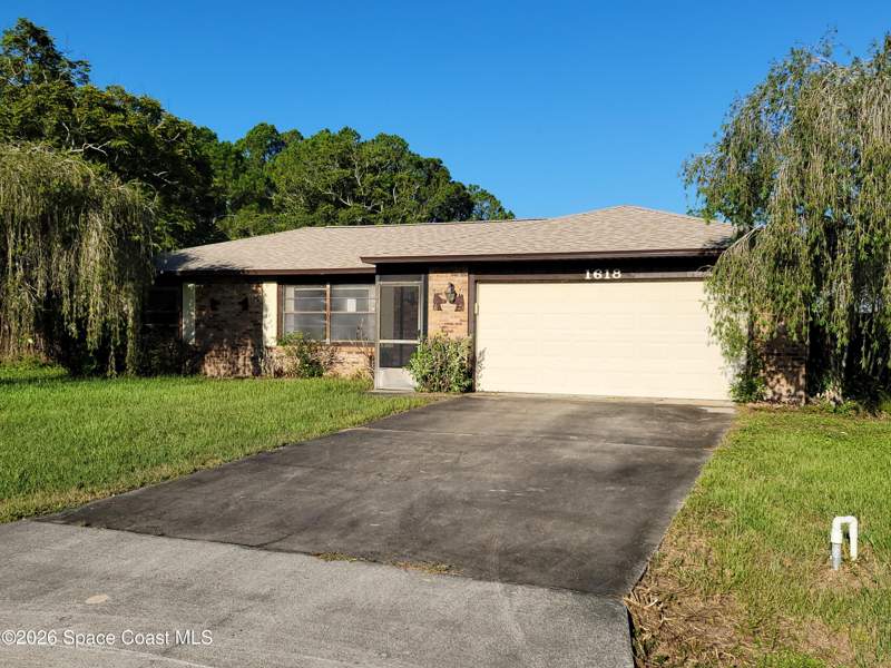 3 bedroom Single Family Residence at 1618 NW Givens Court, Port Malabar Unit 39, Palm Bay — photo 2