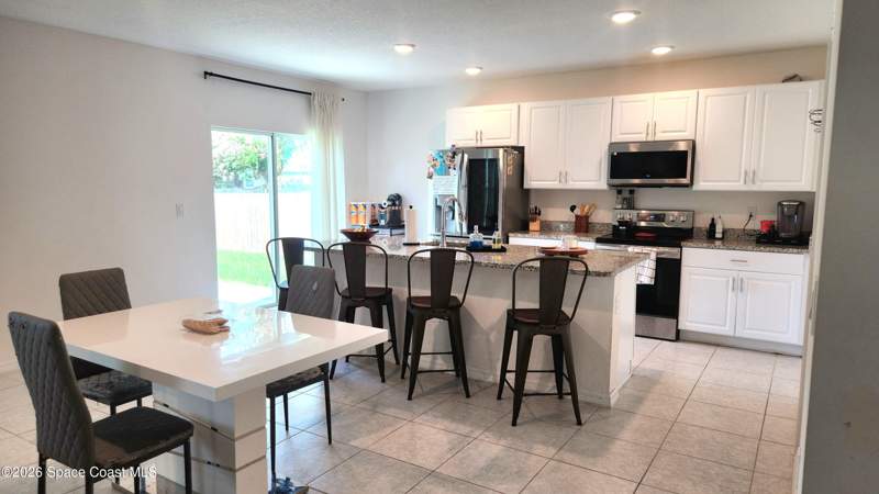 4 bedroom Single Family Residence at 1051 Pope Street, Port Malabar Unit 42, Palm Bay — photo 5