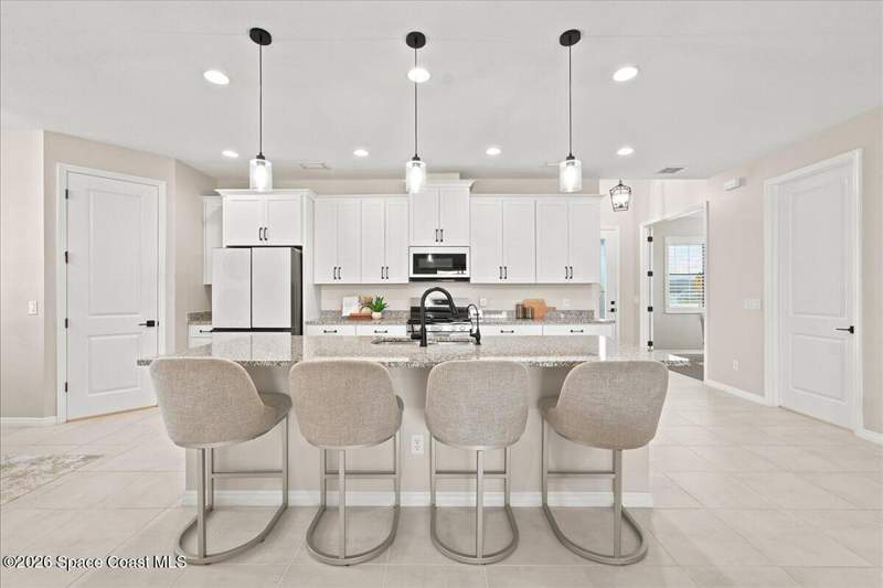 4 bedroom Single Family Residence at 8138 Dobre Way, Sendero Cove & Sierra Cove At Addison Village Phase 2, Melbourne — photo 4