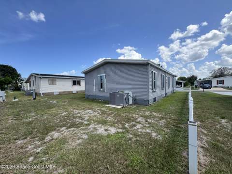 438 Puffin Drive, Barefoot Bay FL - photo 9 of 37