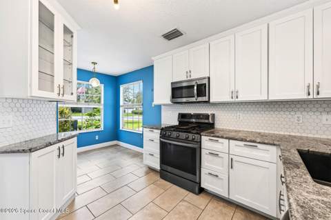 1599 Pga Boulevard, Melbourne FL - photo 9 of 32