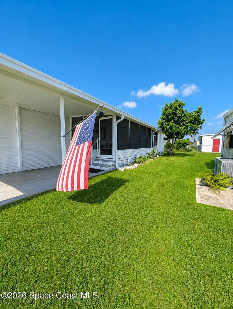 2 bedroom Manufactured Home at 920 Hyacinth Circle, Barefoot Bay Unit 2 Part 10, Barefoot Bay — photo 3