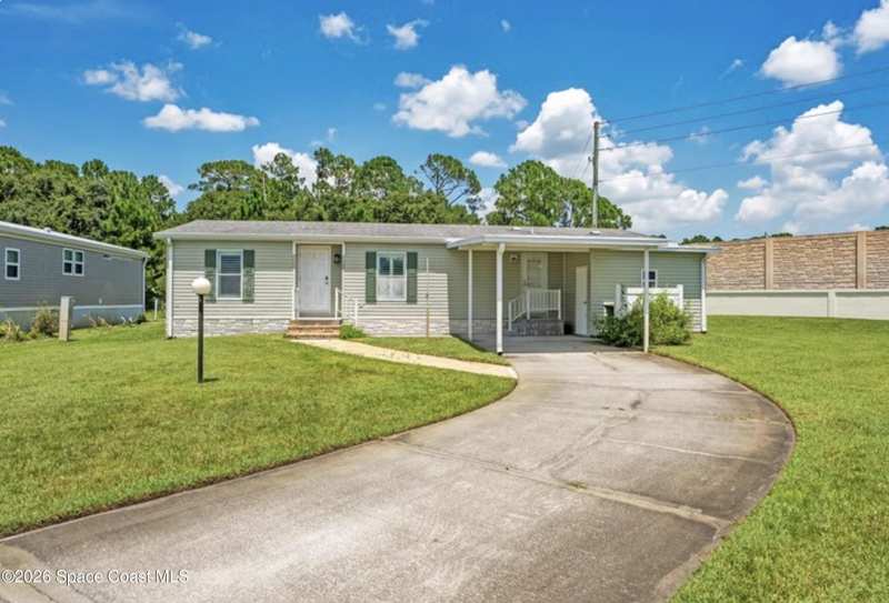 3 bedroom Manufactured Home at 585 Outer Drive, Northwest Lakes Condo Ph Vi, Cocoa — photo 1
