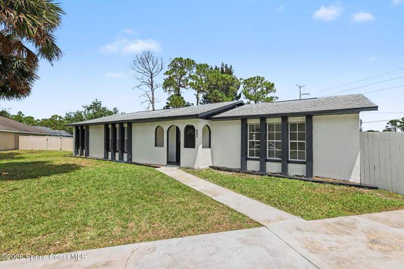 4 bedroom Single Family Residence at 801 Kecherburg Road, Port Malabar Unit 37, Palm Bay — photo 2