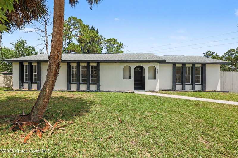 4 bedroom Single Family Residence at 801 Kecherburg Road, Port Malabar Unit 37, Palm Bay — photo 1