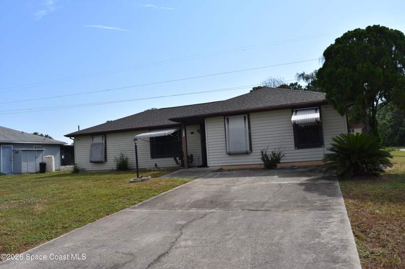 4 bedroom Single Family Residence at 277 High Road, Port Malabar Unit 26, Palm Bay — photo 2