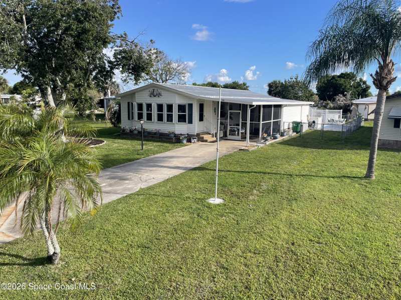 2 bedroom Single Family Residence at 706 Lantania Drive, Barefoot Bay Unit 2 Part 11, Barefoot Bay — photo 1