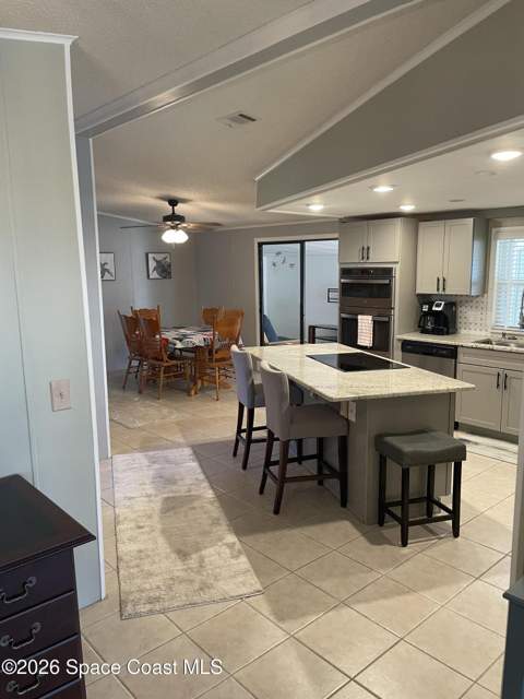 706 Lantania Drive, Barefoot Bay FL - photo 16 of 56