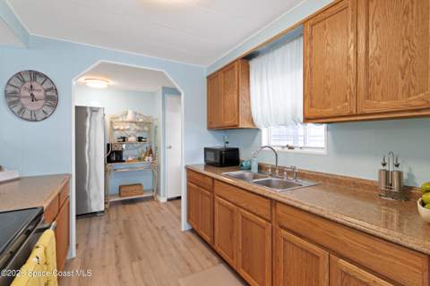 1115 Wren Circle, Barefoot Bay FL - photo 7 of 56
