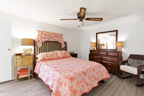 1115 Wren Circle, Barefoot Bay FL - photo 10 of 56
