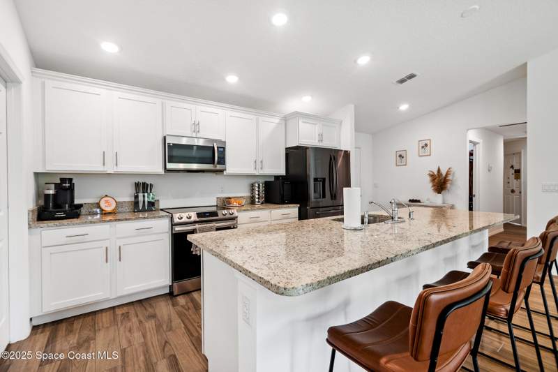 4 bedroom Single Family Residence at 1850 Thorman Avenue, Port Malabar Unit 18, Palm Bay — photo 4