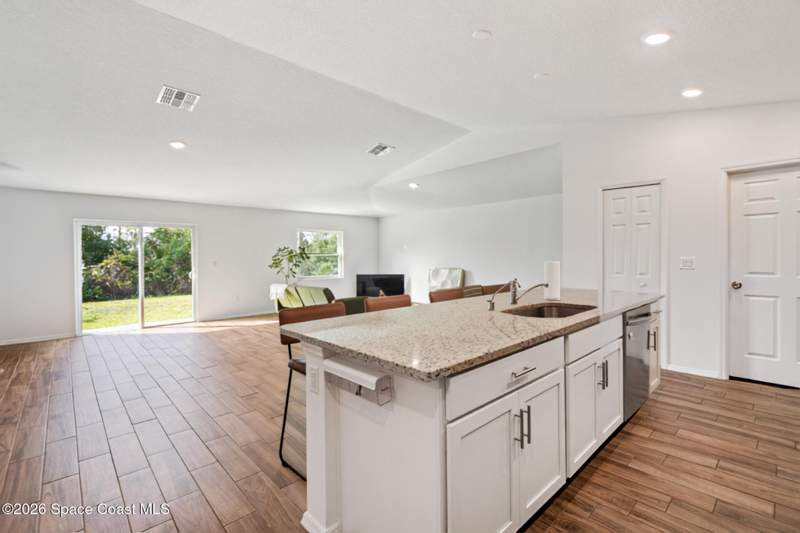 4 bedroom Single Family Residence at 1850 Thorman Avenue, Port Malabar Unit 18, Palm Bay — photo 5