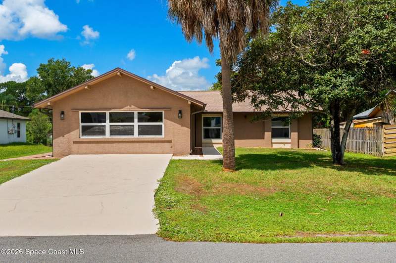 4 bedroom Single Family Residence at 814 Campina Avenue, Port Malabar Unit 11, Palm Bay — photo 1