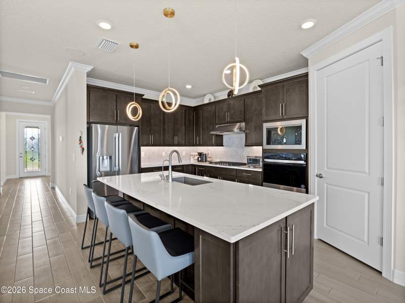 4 bedroom Single Family Residence at 8994 Nixie Avenue, Del Webb at Viera Phase 3, Melbourne — photo 5