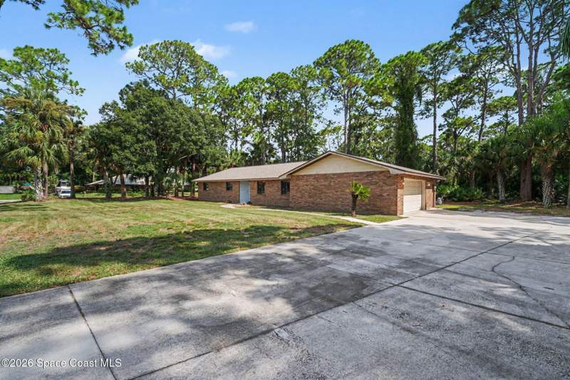 4 bedroom Single Family Residence at 8001 Pine Needle Lane, Sheridan Estates, West Melbourne — photo 5