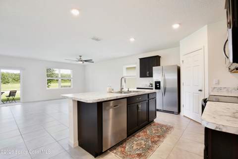3020 Burrowing Owl Drive, Mims FL - photo 6 of 59