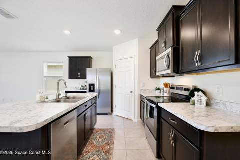 3020 Burrowing Owl Drive, Mims FL - photo 7 of 59