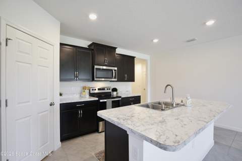 3020 Burrowing Owl Drive, Mims FL - photo 9 of 59