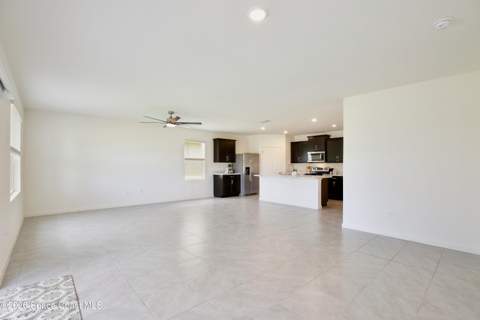 3020 Burrowing Owl Drive, Mims FL - photo 12 of 59