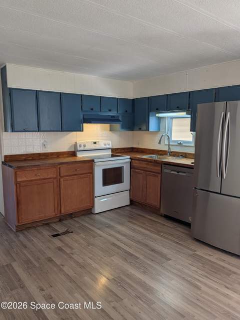 1009 Buttonwood Street, Barefoot Bay FL - photo 11 of 26