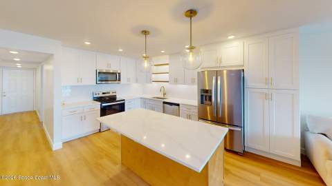 3833 S Banana River Boulevard #403, Cocoa Beach FL - photo 12 of 64