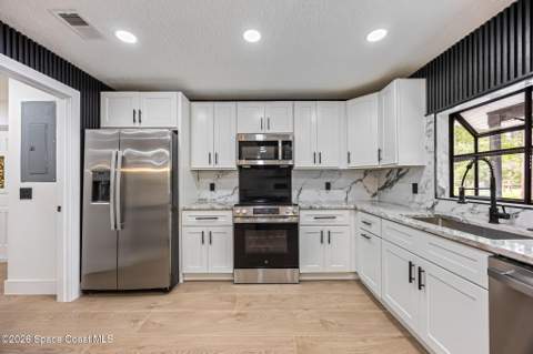 3640 Orlando Avenue, Mims FL - photo 15 of 56