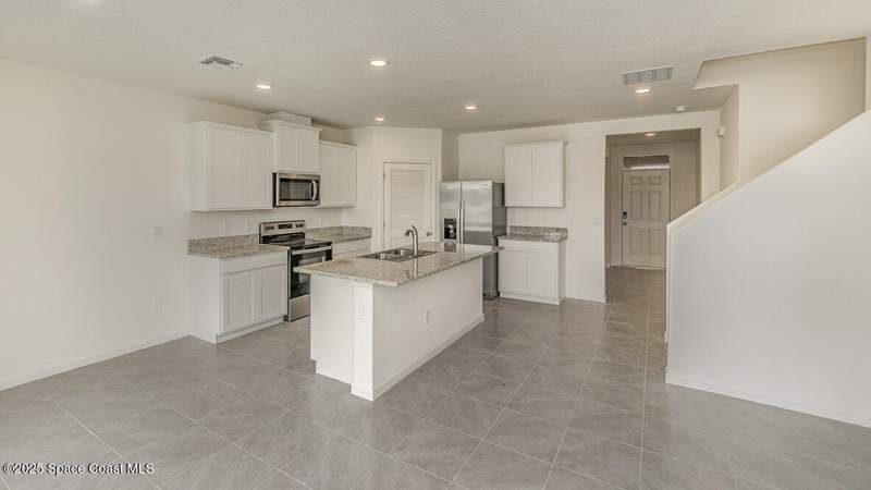 5 bedroom Single Family Residence at 3061 Madden Avenue, Port Malabar Unit 49, Palm Bay — photo 4