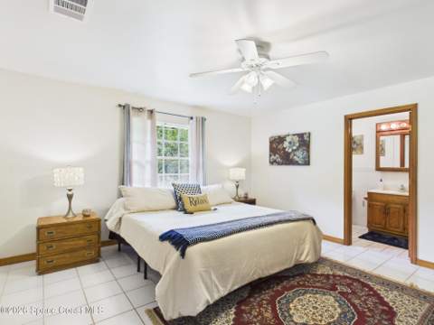 9545 Honeysuckle Drive, Micco FL - photo 11 of 26