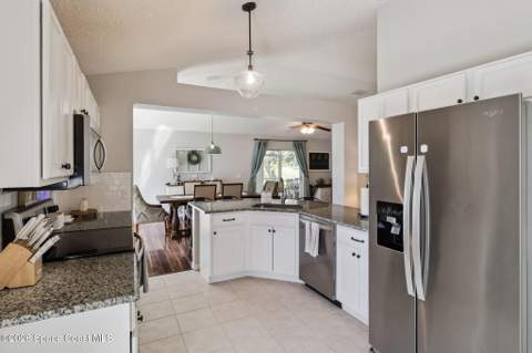 1672 Sawgrass Drive, Palm Bay FL - photo 7 of 30