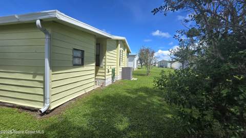 1471 Barefoot Circle, Barefoot Bay FL - photo 7 of 20