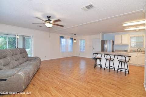 840 Hyacinth Circle, Barefoot Bay FL - photo 10 of 58