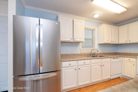 840 Hyacinth Circle, Barefoot Bay FL - photo 7 of 58