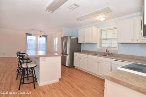 840 Hyacinth Circle, Barefoot Bay FL - photo 8 of 58