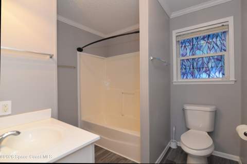 840 Hyacinth Circle, Barefoot Bay FL - photo 23 of 58