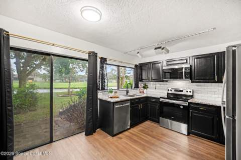 907 Osprey Drive, Melbourne FL - photo 8 of 36