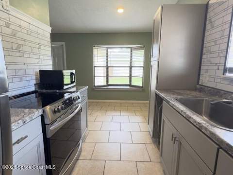 1200 Nienburg Avenue, Palm Bay FL - photo 9 of 33