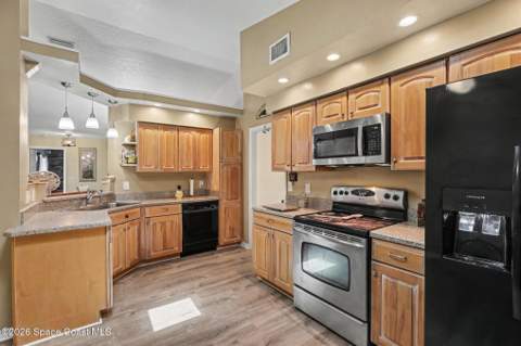 594 Pine Forest Court, Melbourne FL - photo 9 of 39