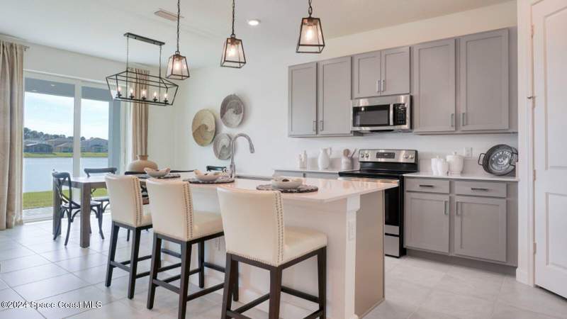 4 bedroom Single Family Residence at 2155 Majorelle Drive, Riverwood at Everlands, Palm Bay — photo 3