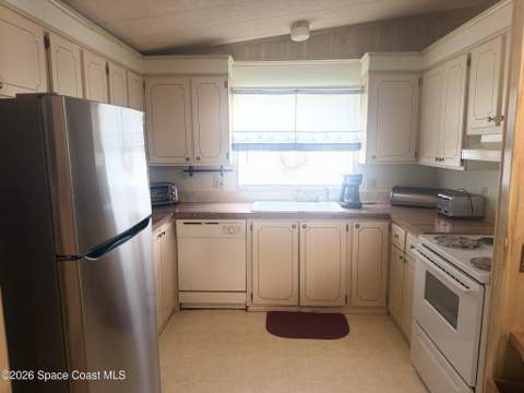 515 Royal Tern Drive, Barefoot Bay FL - photo 7 of 23