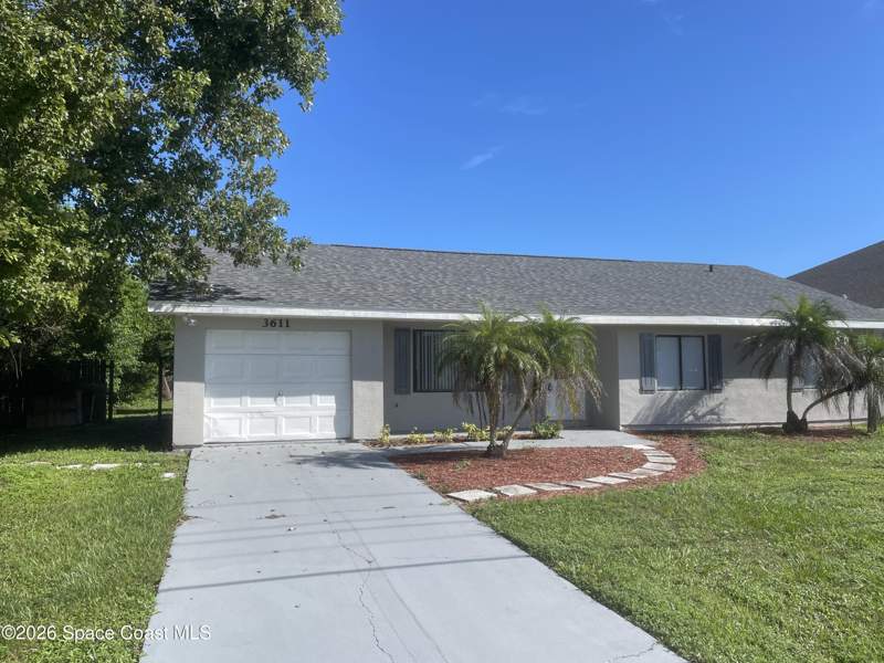 4 bedroom Single Family Residence at 3611 Jupiter Boulevard, Port Malabar Unit 9, Palm Bay — photo 2
